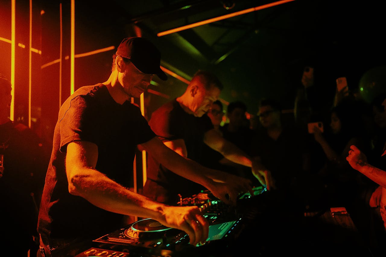 Dynamic DJ performance in a vibrant club setting, capturing the essence of nightlife energy.